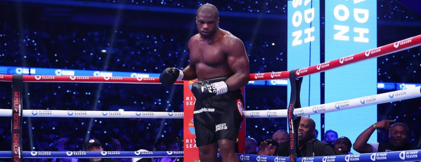 Boxer Daniel Dubois in the ring at Wembley Stadium sporting the Prostate Cancer UK logo during his victory over Anthony Joshua