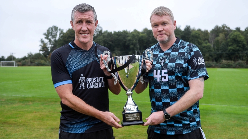 Prostate United men holding trophy.jpg