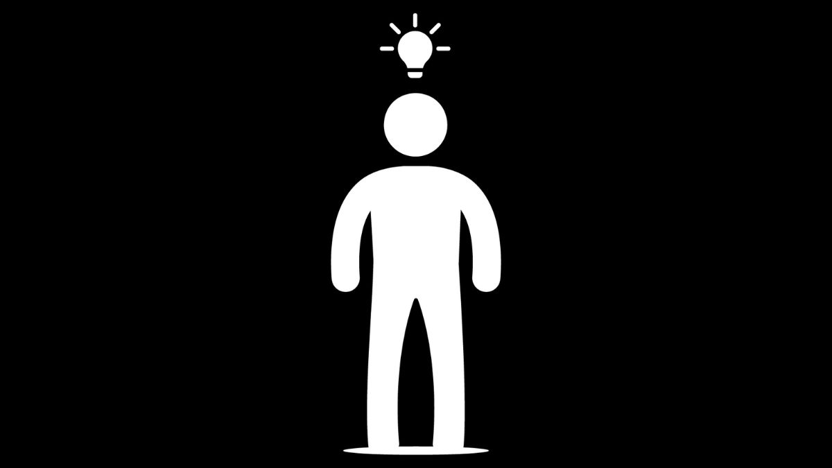 A man icon with a lightbulb above its head