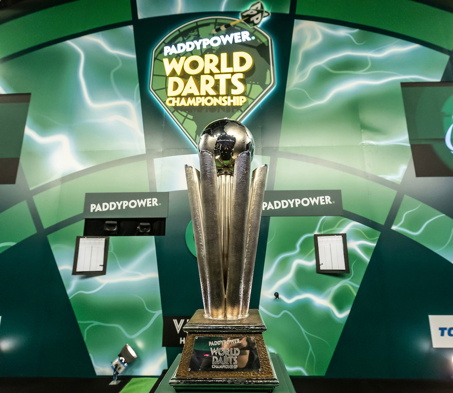 The World Darts Championship trophy in front of a Paddy Power branded display at Alexandra Palace.