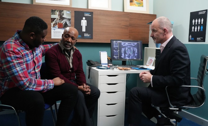 A GP talking to two Black men about prostate cancer