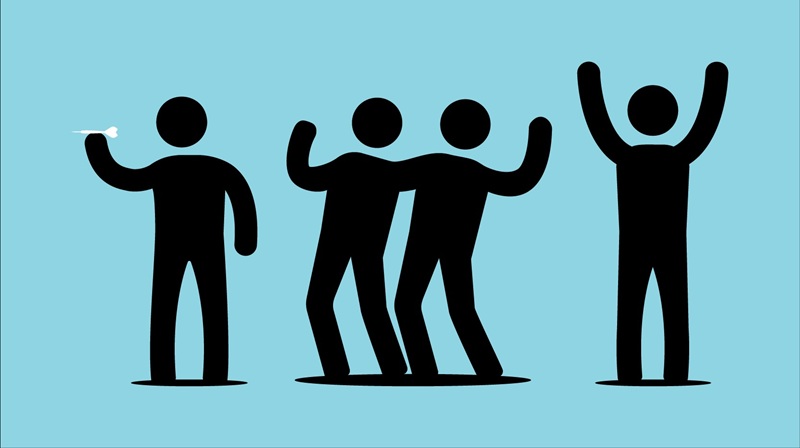 A man icon throwing a dart while three other man icons cheer, on a blue background