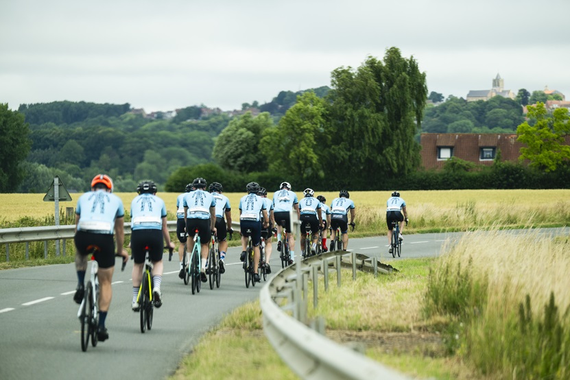 cyclists going down a road