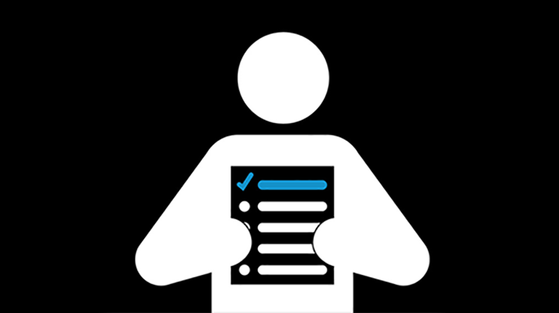 Man of Men holding a checklist