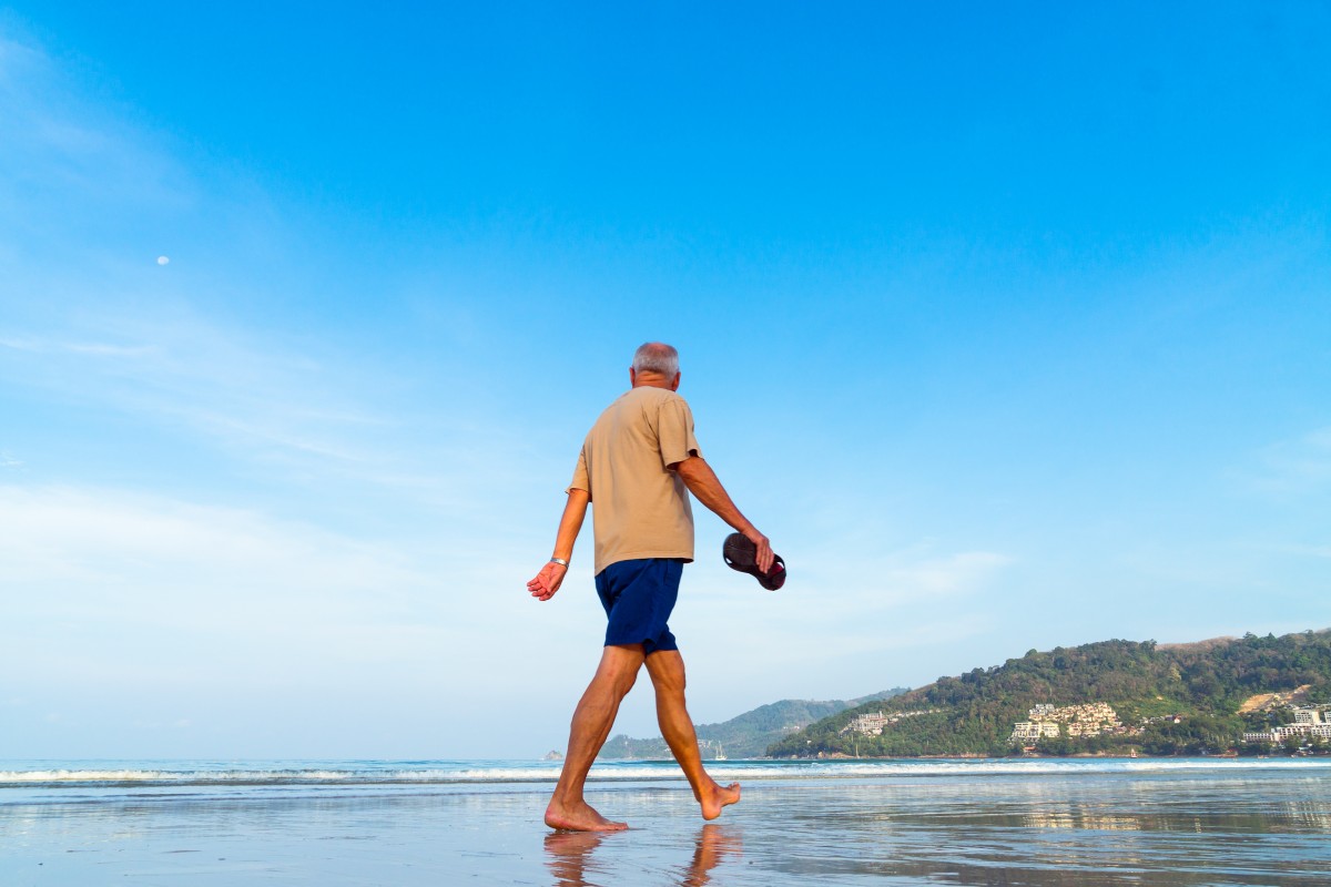 Man walking on beach